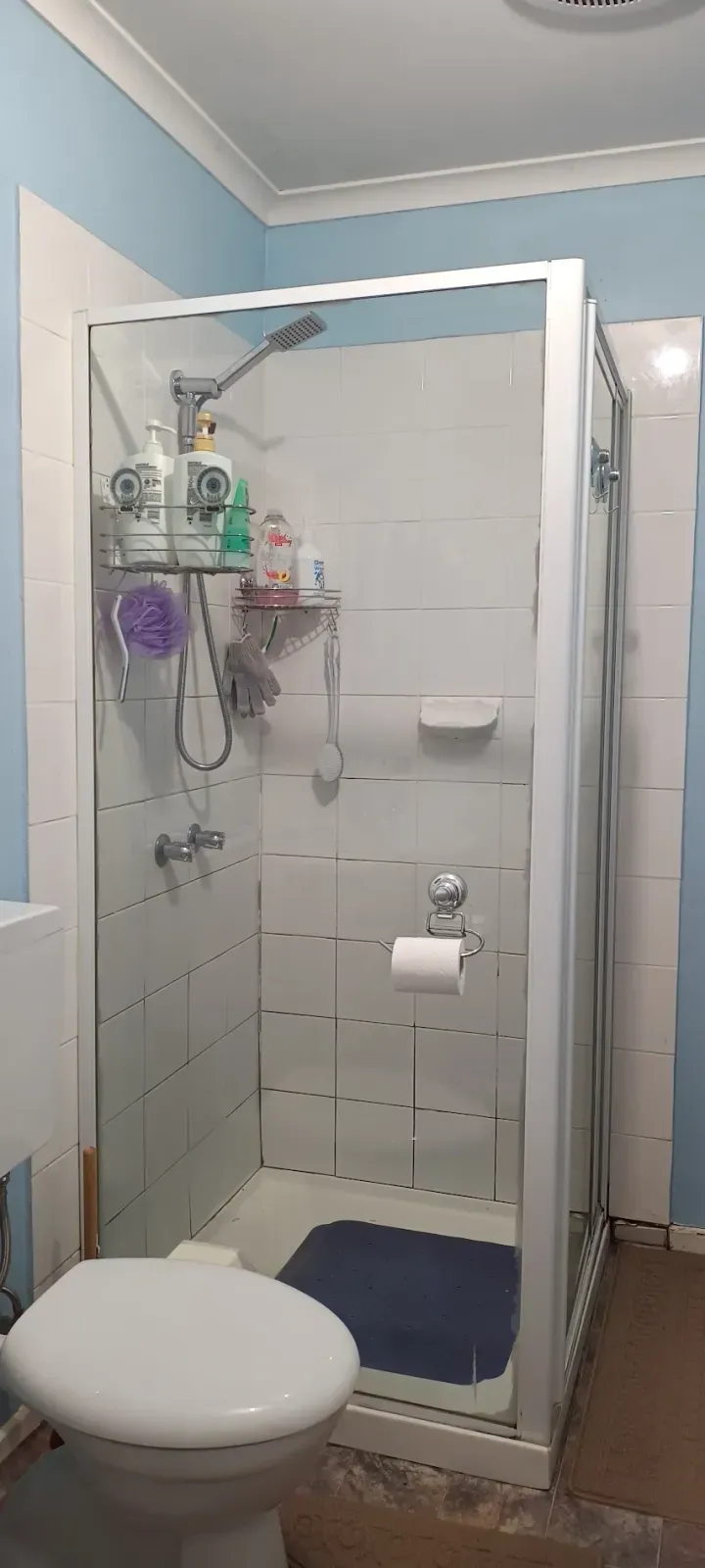 the same shower before: old tile and grout